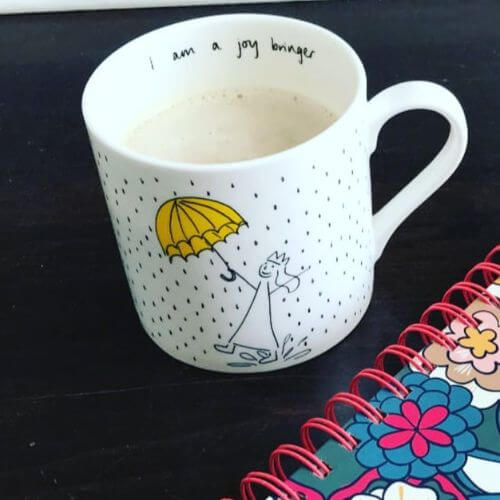 Favorite things - hot chocolate in my Joy Bringer cup with my planner.